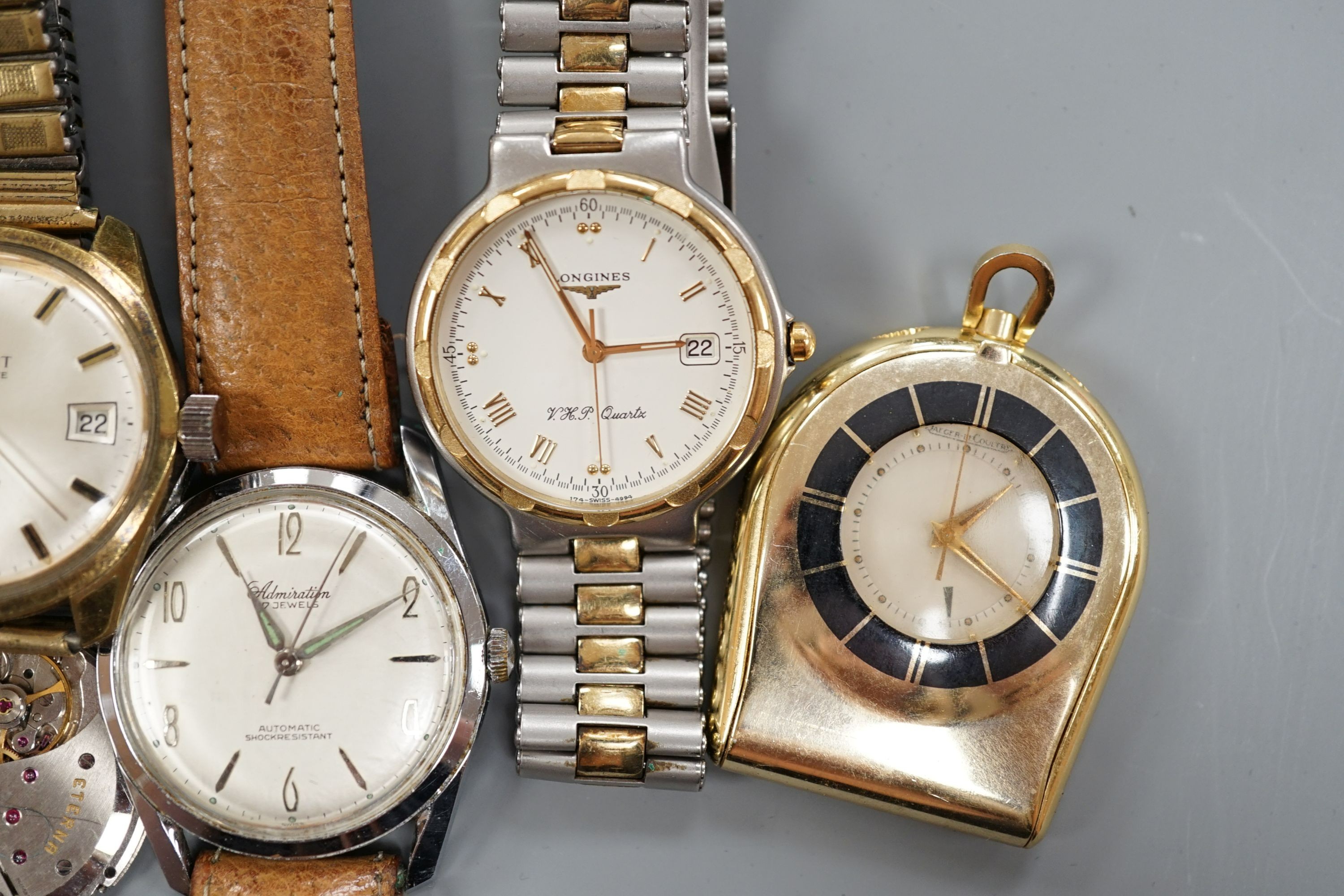 Three gentleman's wrist watches, Tissot, Longines VHP quartz and Admiration, an Eterna movement and a Jaeger LeCoultre travelling watch.